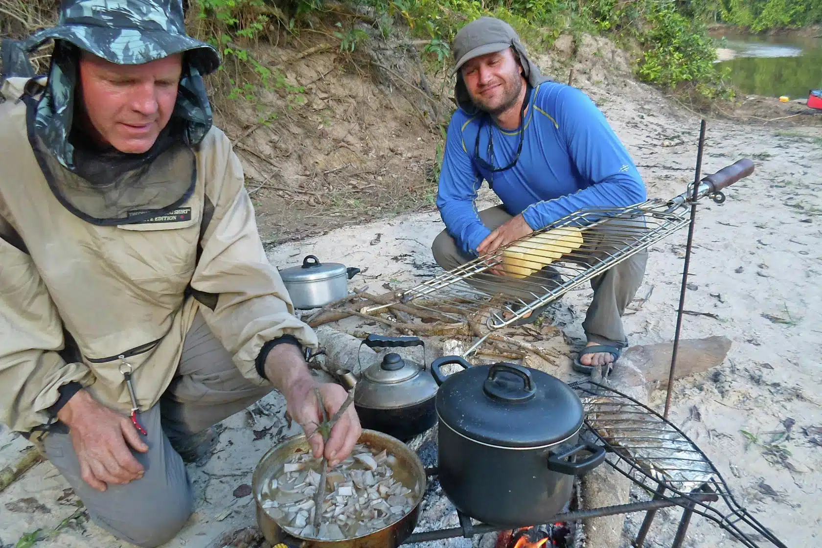 Dave Freeman and Paul Schurke Cooking On The Campfire