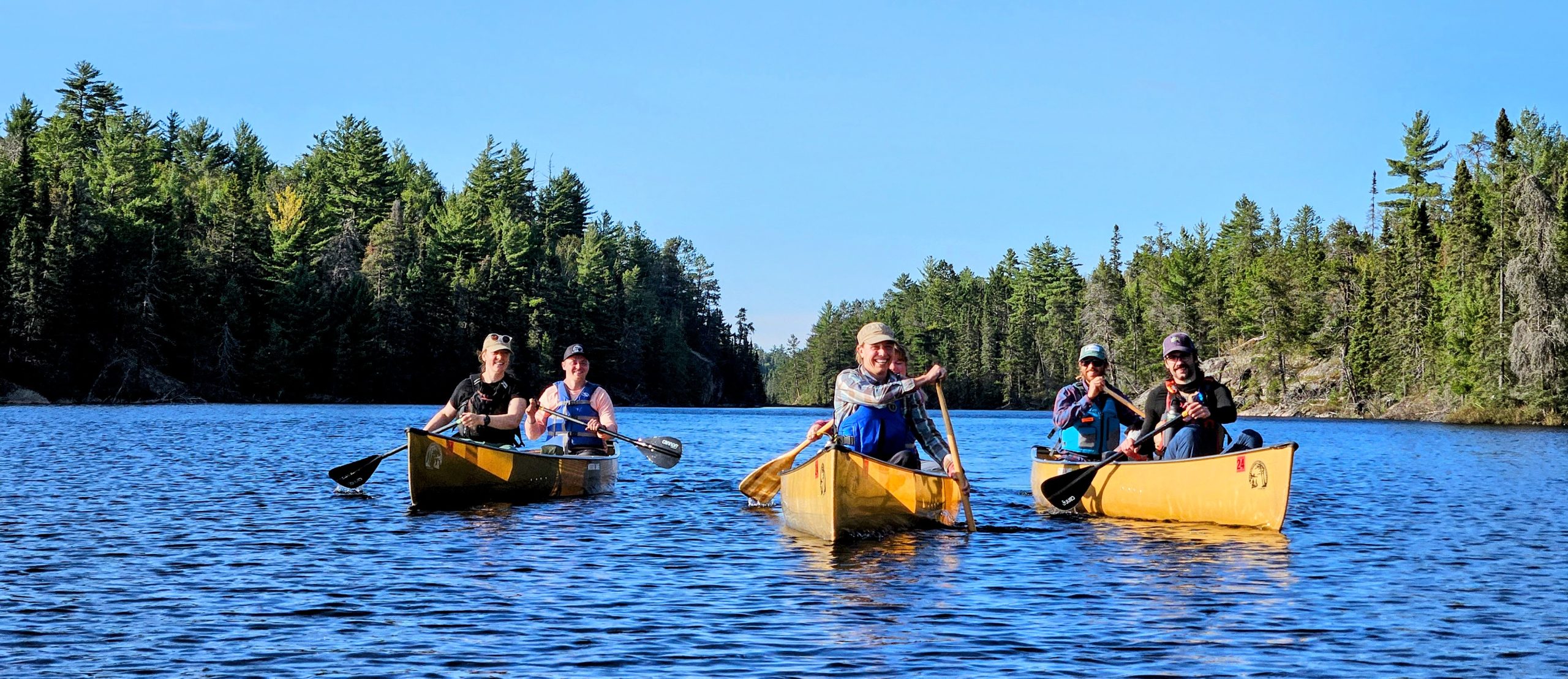 Six paddlers in three canoes in the BWCAW.